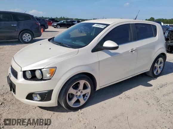 2013 Chevrolet Sonic LTZ с VIN 1G1JE6SB7D4200291, выставлен на аукционе Copart как лот 66943785 с пробегом 126 250 миль миль и Чистый • Clean title. История ставок и продаж доступна на DreamBid. Изображение 1.