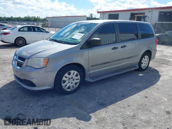 2014 Dodge Grand Caravan SE with VIN 2C4RDGBG1ER222834, listed as a IAAI auction lot 43446390 with 61,337 mi miles and . Bid and sale history available at DreamBid. Image 2.