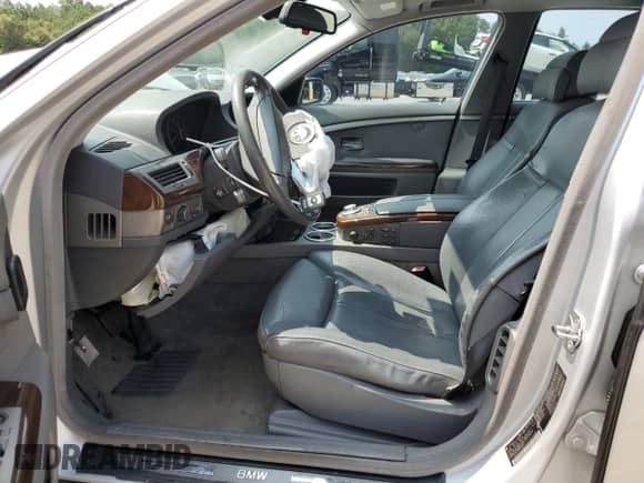 2004 BMW 7 Series 745Li with VIN WBAGN63444DS47664, listed as a Copart auction lot 71046044 with 144,598 mi miles and Salvage title. Bid and sale history available at DreamBid. Image 7.