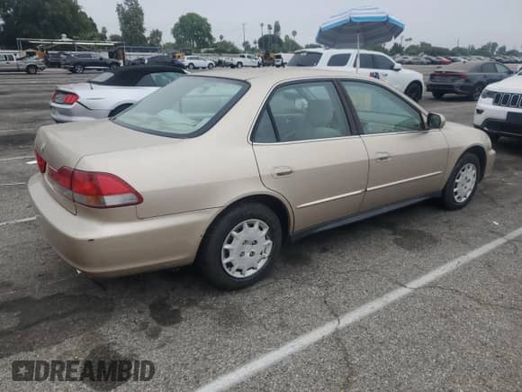 2001 Honda Accord LX z VIN 1HGCG56461A057154, wystawiony jako Copart lot #65963735 z przebiegiem 159 765 mil mil oraz Czysty tytuł • Clean title. Historia ofert i sprzedaży dostępna na DreamBid. Obrazek 3.