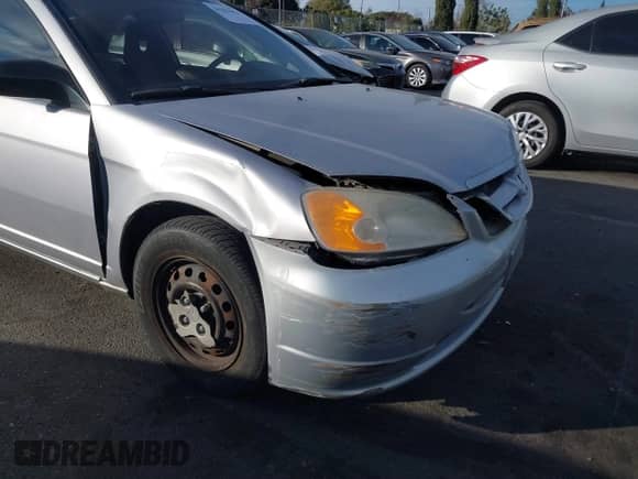 2002 Honda Civic with VIN 1HGEM21292L042403, listed as a IAAI auction lot 41253054 with 95,053 mi miles and . Bid and sale history available at DreamBid. Image 12.