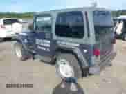 2001 Jeep Wrangler Sport z VIN 1J4FA49S01P329609, wystawiony jako IAAI lot #43091103 z przebiegiem 151 346 mil mil oraz . Historia ofert i sprzedaży dostępna na DreamBid. Obrazek 3.