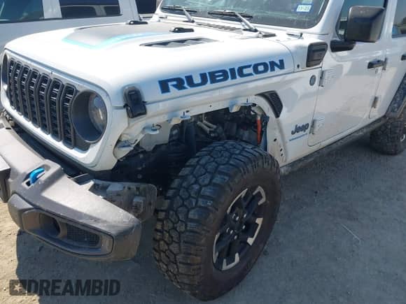 2024 Jeep Wrangler Rubicon with VIN 1C4RJXR60RW223430, listed as a IAAI auction lot 43343638 with 53,374 mi miles and . Bid and sale history available at DreamBid. Image 6.