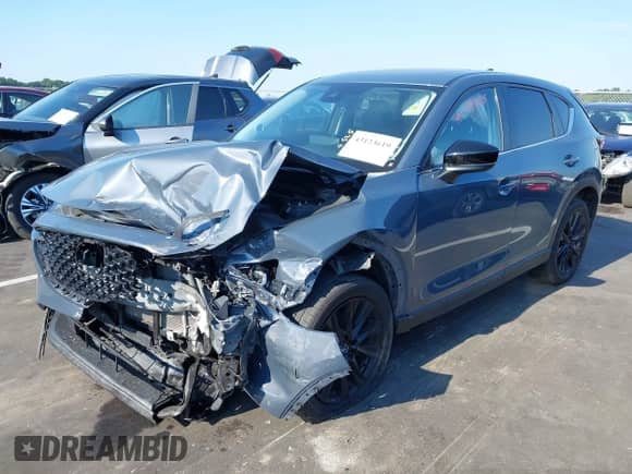 2023 Mazda CX-5 S Preferred z VIN JM3KFBCM6P0209360, wystawiony jako IAAI lot #43123619 z przebiegiem Nie podano mil oraz . Historia ofert i sprzedaży dostępna na DreamBid. Obrazek 16.