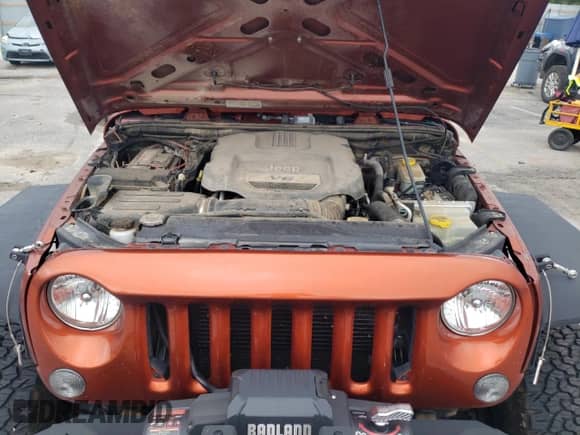 2014 Jeep Wrangler Rubicon with VIN 1C4BJWCG2EL303420, listed as a Copart auction lot 63550985 with 87,175 mi miles and Salvage title. Bid and sale history available at DreamBid. Image 12.