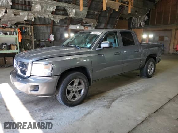 2008 Dodge Dakota SLT с VIN 1D7HW48N88S632145, выставлен на аукционе Copart как лот 71955855 с пробегом 95 363 миль миль и Списание • Salvage title. История ставок и продаж доступна на DreamBid. Изображение 1.