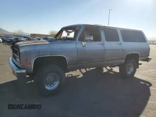 1989 Chevrolet Suburban с VIN 1GNGV26K8KF128711, выставлен на аукционе Copart как лот 46658895 с пробегом Не указан миль и Списание • Salvage title. История ставок и продаж доступна на DreamBid. Изображение 1.