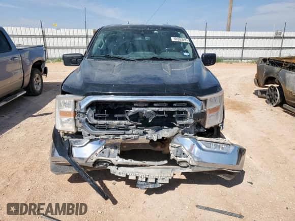 2021 Ford F-150 XL с VIN 1FTEW1EBXMFD09661, выставлен на аукционе Copart как лот 69205095 с пробегом 132 055 миль миль и Списание • Salvage title. История ставок и продаж доступна на DreamBid. Изображение 5.