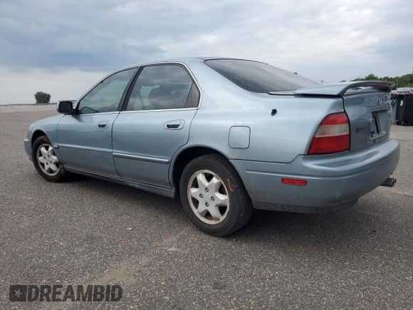 1995 Honda Accord with VIN 1HGCE6660SA003024, listed as a Copart auction lot 66928635 with 95,299 mi miles and Salvage title. Bid and sale history available at DreamBid. Image 2.