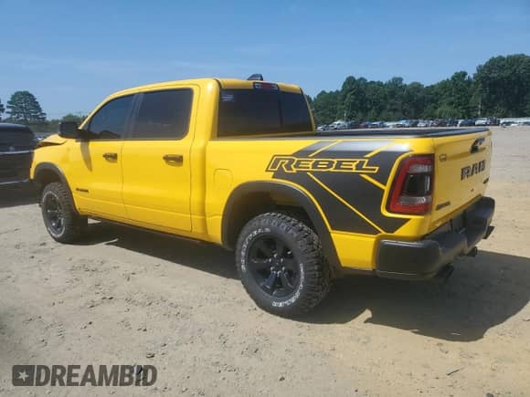 2023 Ram 1500 Rebel with VIN 1C6SRFLT5PN695135, listed as a Copart auction lot 65928305 with 11,152 mi miles and Salvage title. Bid and sale history available at DreamBid. Image 2.