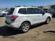 2014 Subaru Forester Premium with VIN JF2SJACC7EG459947, listed as a Copart auction lot 64106135 with 151,033 mi miles and Salvage title. Bid and sale history available at DreamBid. Image 3.