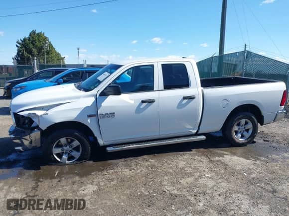2014 Ram 1500 Express z VIN 1C6RR7FT6ES219975, wystawiony jako IAAI lot #41864917 z przebiegiem 165 675 mil mil oraz . Historia ofert i sprzedaży dostępna na DreamBid. Obrazek 14.