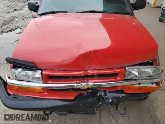 2001 Chevrolet Blazer LS z VIN 1GNCT18W71K247094, wystawiony jako Copart lot #53748065 z przebiegiem 145 695 mil mil oraz Szkoda całkowita • Salvage title. Historia ofert i sprzedaży dostępna na DreamBid. Obrazek 11.