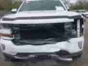2016 Chevrolet Silverado 1500 LT with VIN 3GCUKREC0GG363536, listed as a IAAI auction lot 42064592 with 99,881 mi miles and . Bid and sale history available at DreamBid. Image 6.