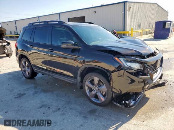 2020 Honda Passport Touring with VIN 5FNYF7H98LB005966, listed as a Copart auction lot 71123705 with 52,725 mi miles and Clean title. Bid and sale history available at DreamBid. Image 4.