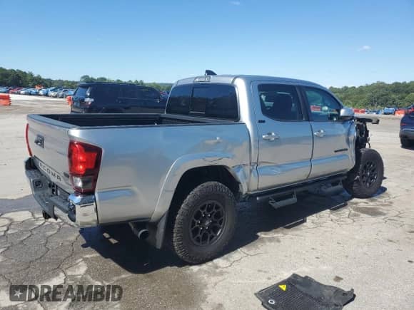 2022 Toyota Tacoma SR5 with VIN 3TMAZ5CN3NM192341, listed as a Copart auction lot 71441435 with 52,057 mi miles and Salvage title. Bid and sale history available at DreamBid. Image 3.
