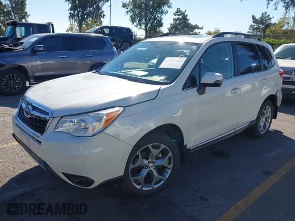 2016 Subaru Forester Touring with VIN JF2SJAXC4GH537026, listed as a IAAI auction lot 43501461 with 66,452 mi miles and . Bid and sale history available at DreamBid. Image 2.