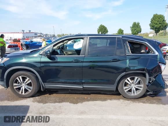 2017 Honda Pilot EX-L with VIN 5FNYF6H83HB078395, listed as a IAAI auction lot 43346617 with 198,983 mi miles and . Bid and sale history available at DreamBid. Image 14.