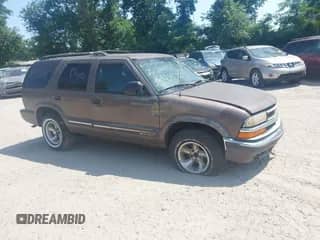 2000 Chevrolet Blazer LS z VIN 1GNCS13W0Y2262721, wystawiony jako IAAI lot #42538224 z przebiegiem Nie podano mil oraz . Historia ofert i sprzedaży dostępna na DreamBid. Obrazek 1.