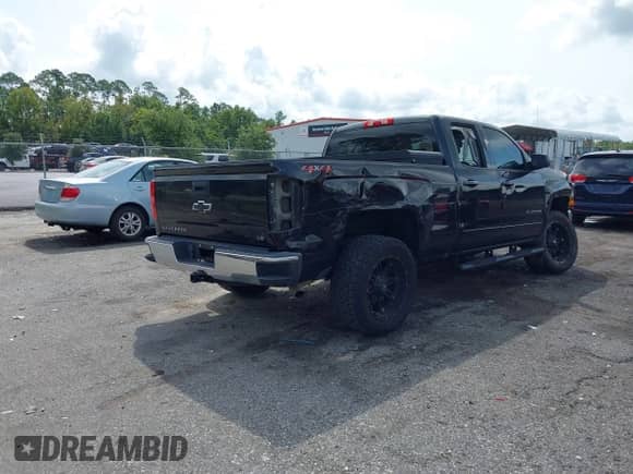 2019 Chevrolet Silverado 1500 LT with VIN 2GCVKPEC7K1173341, listed as a IAAI auction lot 43202699 with 108,186 mi miles and . Bid and sale history available at DreamBid. Image 4.