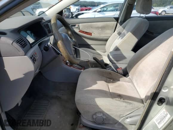 2003 Toyota Corolla LE with VIN JTDBR32E630035428, listed as a Copart auction lot 84373095 with 240,413 mi miles and Salvage title. Bid and sale history available at DreamBid. Image 7.