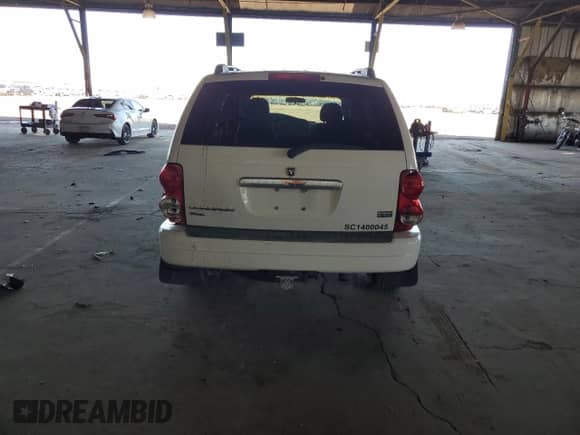 2004 Dodge Durango SLT z VIN 1D4HD48D04F116102, wystawiony jako Copart lot #53840835 z przebiegiem 89 899 mil mil oraz Szkoda całkowita • Salvage title. Historia ofert i sprzedaży dostępna na DreamBid. Obrazek 6.