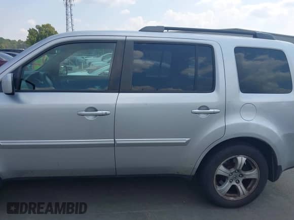 2012 Honda Pilot EX with VIN 5FNYF4H41CB014429, listed as a IAAI auction lot 43266152 with 207,093 mi miles and . Bid and sale history available at DreamBid. Image 14.