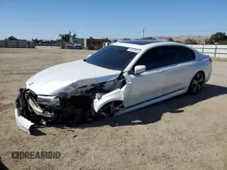 2019 BMW 7 Series 740i with VIN WBA7E2C55KB454428, listed as a Copart auction lot 64503005 with 65,029 mi miles and Salvage title. Bid and sale history available at DreamBid. Image 1.