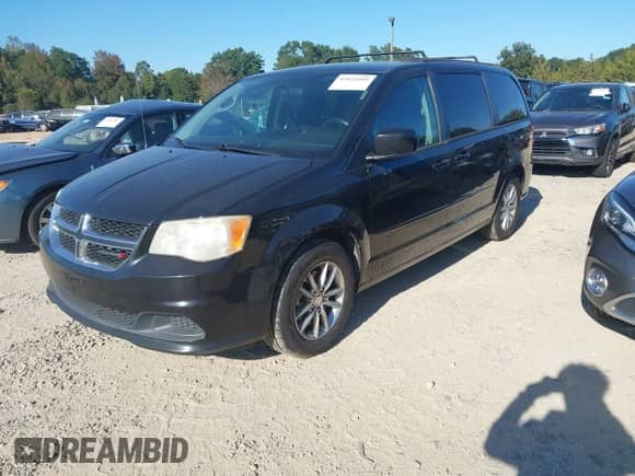 2014 Dodge Grand Caravan SXT with VIN 2C4RDGCG5ER122475, listed as a IAAI auction lot 43423105 with 189,985 mi miles and . Bid and sale history available at DreamBid. Image 2.