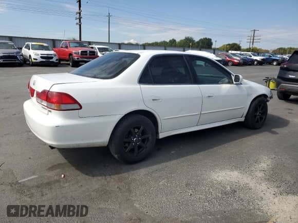 2002 Honda Accord EX with VIN 1HGCG165X2A077376, listed as a Copart auction lot 80703385 with 106,051 mi miles and Salvage title. Bid and sale history available at DreamBid. Image 3.