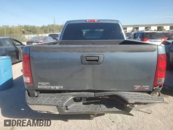 2008 GMC Sierra 1500 SL with VIN 2GTEK13C281133273, listed as a Copart auction lot 74211334 with 188,476 mi miles and Salvage title. Bid and sale history available at DreamBid. Image 6.