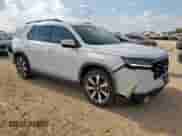 2024 Honda Pilot Touring with VIN 5FNYG1H72RB023817, listed as a Copart auction lot 69754565 with 30,118 mi miles and Salvage title. Bid and sale history available at DreamBid. Image 4.