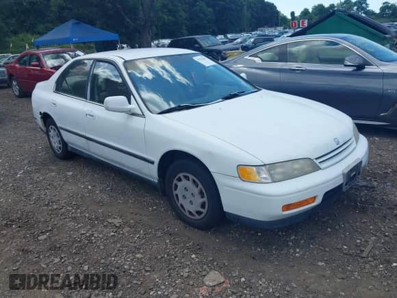 1994 Honda Accord with VIN 1HGCD564XRA014313, listed as a IAAI auction lot 42796801 with 76,616 mi miles and . Bid and sale history available at DreamBid. Image 1.