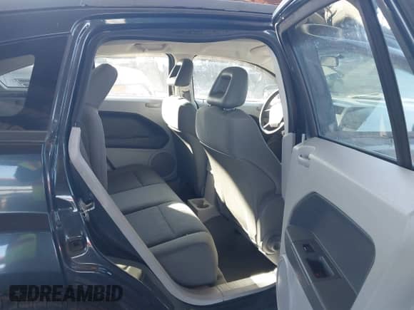 2007 Dodge Caliber SXT with VIN 1B3HB48B47D340900, listed as a IAAI auction lot 43326284 with 77,817 mi miles and . Bid and sale history available at DreamBid. Image 8.