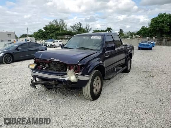 2003 Toyota Tacoma PreRunner z VIN 5TEGM92N53Z281183, wystawiony jako Copart lot #82589225 z przebiegiem 179 742 mil mil oraz Szkoda całkowita • Salvage title. Historia ofert i sprzedaży dostępna na DreamBid. Obrazek 13.