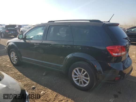 2014 Dodge Journey SXT with VIN 3C4PDDBG9ET181890, listed as a Copart auction lot 80855335 with 101,492 mi miles and Salvage title. Bid and sale history available at DreamBid. Image 2.