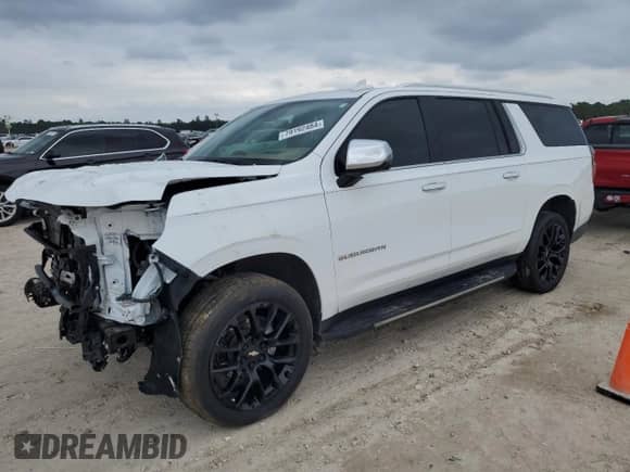 2022 Chevrolet Suburban Premier with VIN 1GNSKFKTXNR303536, listed as a Copart auction lot 79192484 with 67,989 mi miles and Salvage title. Bid and sale history available at DreamBid. Image 1.