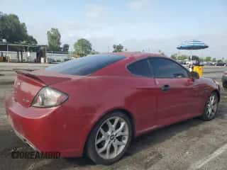 2007 Hyundai Tiburon GT с VIN KMHHN66F27U238272, выставлен на аукционе Copart как лот 59218205 с пробегом 218 279 миль миль и Списание • Salvage title. История ставок и продаж доступна на DreamBid. Изображение 3.