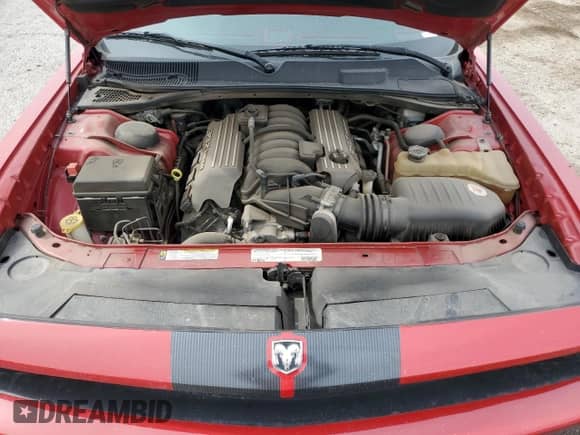 2012 Dodge Challenger SRT-8 392 с VIN 2C3CDYCJ7CH153774, выставлен на аукционе Copart как лот 56973935 с пробегом 52 070 миль миль и Списание • Salvage title. История ставок и продаж доступна на DreamBid. Изображение 11.