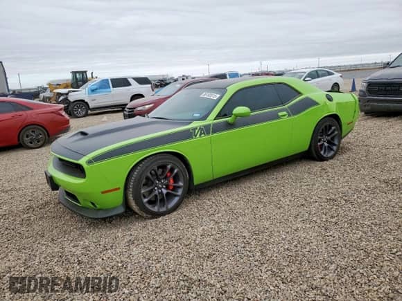2023 Dodge Challenger R/T с VIN 2C3CDZBT7PH645056, выставлен на аукционе Copart как лот 86183515 с пробегом 2 954 миль миль и Списание • Salvage title. История ставок и продаж доступна на DreamBid. Изображение 1.
