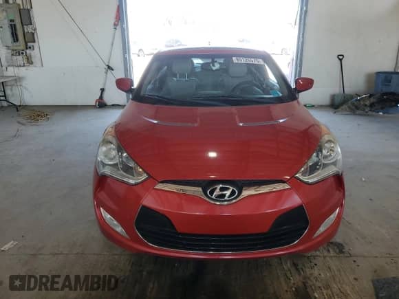 2013 Hyundai Veloster w/Black Int с VIN KMHTC6AD1DU087037, выставлен на аукционе Copart как лот 85126575 с пробегом 137 953 миль миль и Списание • Salvage title. История ставок и продаж доступна на DreamBid. Изображение 5.
