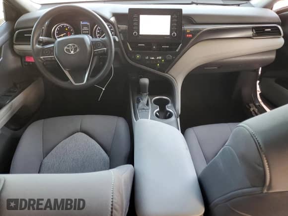 2022 Toyota Camry LE с VIN 4T1C11AK0NU700595, выставлен на аукционе Copart как лот 81089635 с пробегом 20 430 миль миль и Списание • Salvage title. История ставок и продаж доступна на DreamBid. Изображение 8.