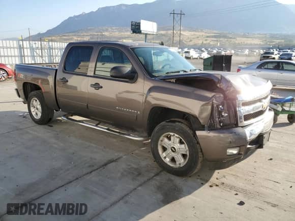2008 Chevrolet Silverado 1500 LTZ with VIN 2GCEK13M981163623, listed as a Copart auction lot 70932835 with 158,096 mi miles and Salvage title. Bid and sale history available at DreamBid. Image 4.