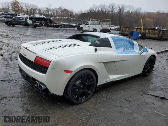 2012 Lamborghini Gallardo с VIN ZHWGU6BZ7CLA11933, выставлен на аукционе Copart как лот 78625754 с пробегом Не указан миль и Списание • Salvage title. История ставок и продаж доступна на DreamBid. Изображение 3.