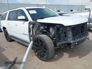 2015 Chevrolet Suburban LT with VIN 1GNSCJKCXFR700715, listed as a IAAI auction lot 42748716 with 169,082 mi miles and . Bid and sale history available at DreamBid. Image 1.