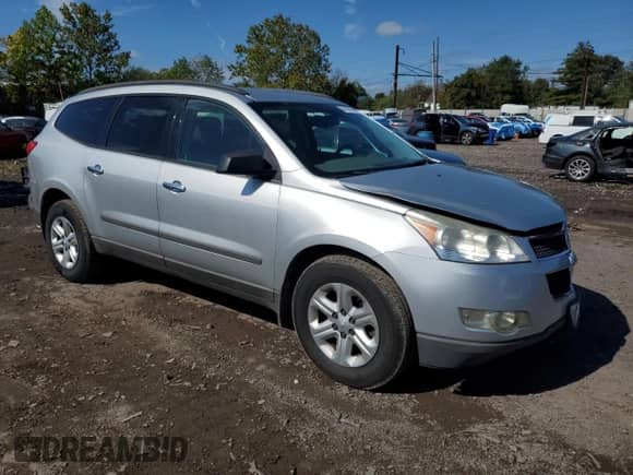 2012 Chevrolet Traverse LS with VIN 1GNKVFED6CJ324486, listed as a Copart auction lot 84168675 with 96,816 mi miles and Salvage title. Bid and sale history available at DreamBid. Image 4.