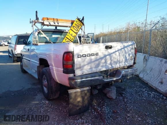 2001 Dodge RAM with VIN 3B7KC266X1M511169, listed as a IAAI auction lot 43080193 with 750,104 mi miles and . Bid and sale history available at DreamBid. Image 3.