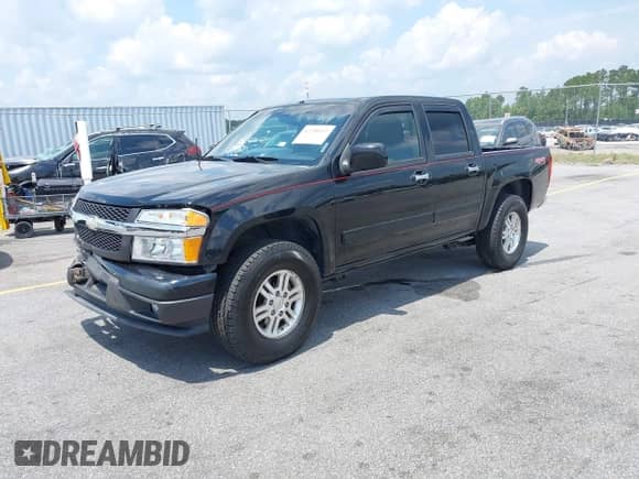 2011 Chevrolet Colorado 1LT z VIN 1GCHTCFE8B8105355, wystawiony jako IAAI lot #42298157 z przebiegiem 213 853 mil mil oraz . Historia ofert i sprzedaży dostępna na DreamBid. Obrazek 2.