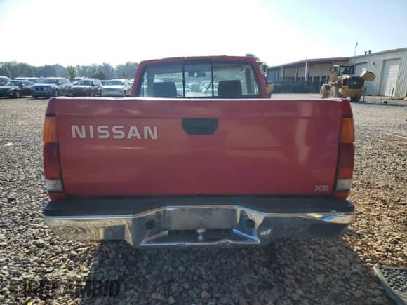 1996 Nissan Frontier XE with VIN 1N6SD11S6TC352180, listed as a Copart auction lot 64635455 with 312,086 mi miles and Salvage title. Bid and sale history available at DreamBid. Image 6.