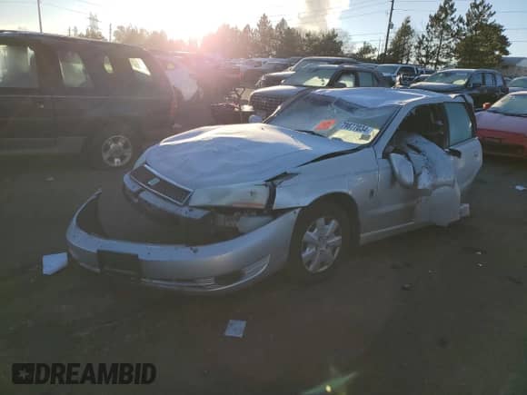 2004 Saturn L L300 1 with VIN 1G8JC54F34Y510089, listed as a Copart auction lot 79877034 with Not provided miles and Non repairable. Bid and sale history available at DreamBid. Image 1.